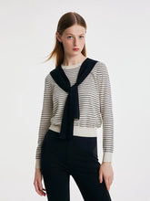 a woman in black shawl